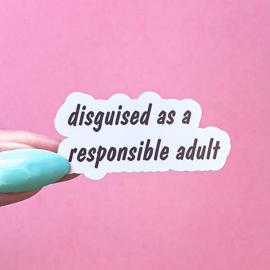 A vinyl decal sticker with black text that reads "disguised as a responsible adult".