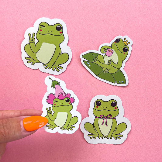 Vinyl decal stickers of cartoon frogs in various poses.