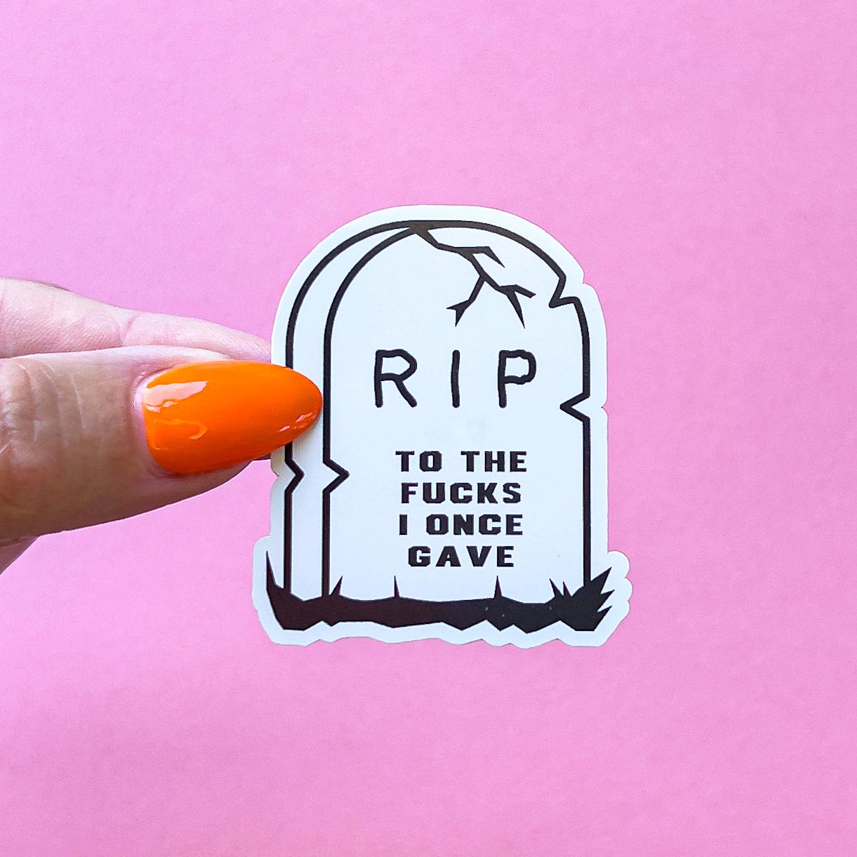 A vinyl decal sticker of a tombstone with the words 'RIP' and 'To the fucks I once gave'.