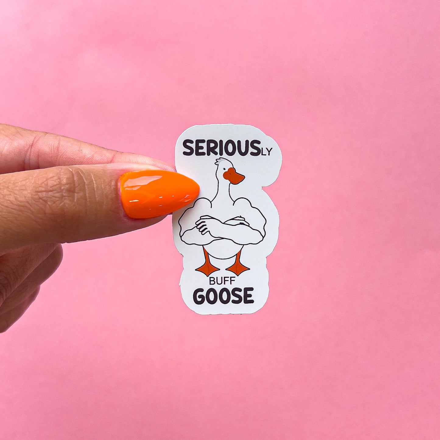 A vinyl decal sticker of a cartoon, buff goose with its arms crossed. The goose has orange feet and a beak. The text on the sticker reads 'SERIOUSLY BUFF GOOSE'.