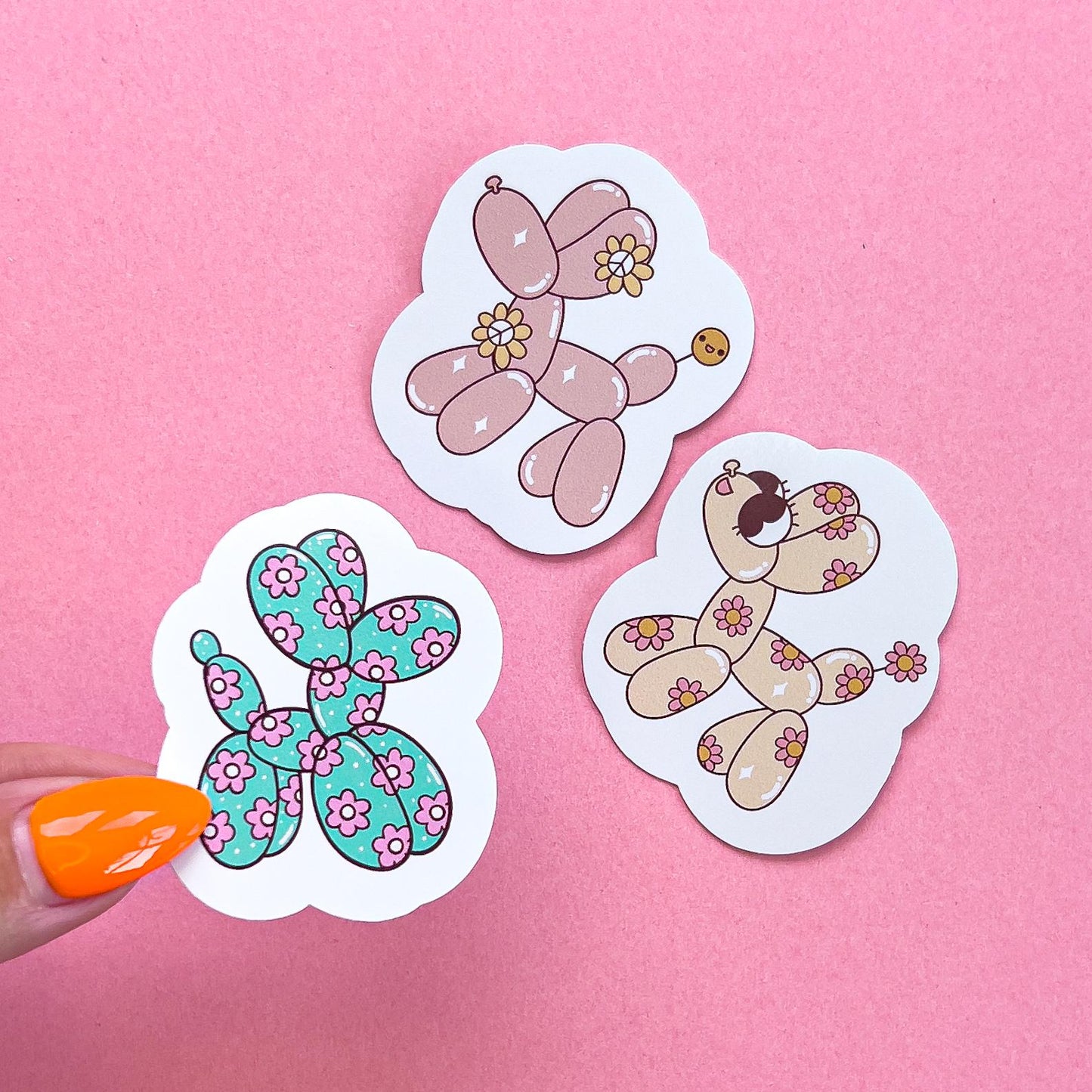 Vinyl decal stickers of balloon dogs in various colors and patterns.