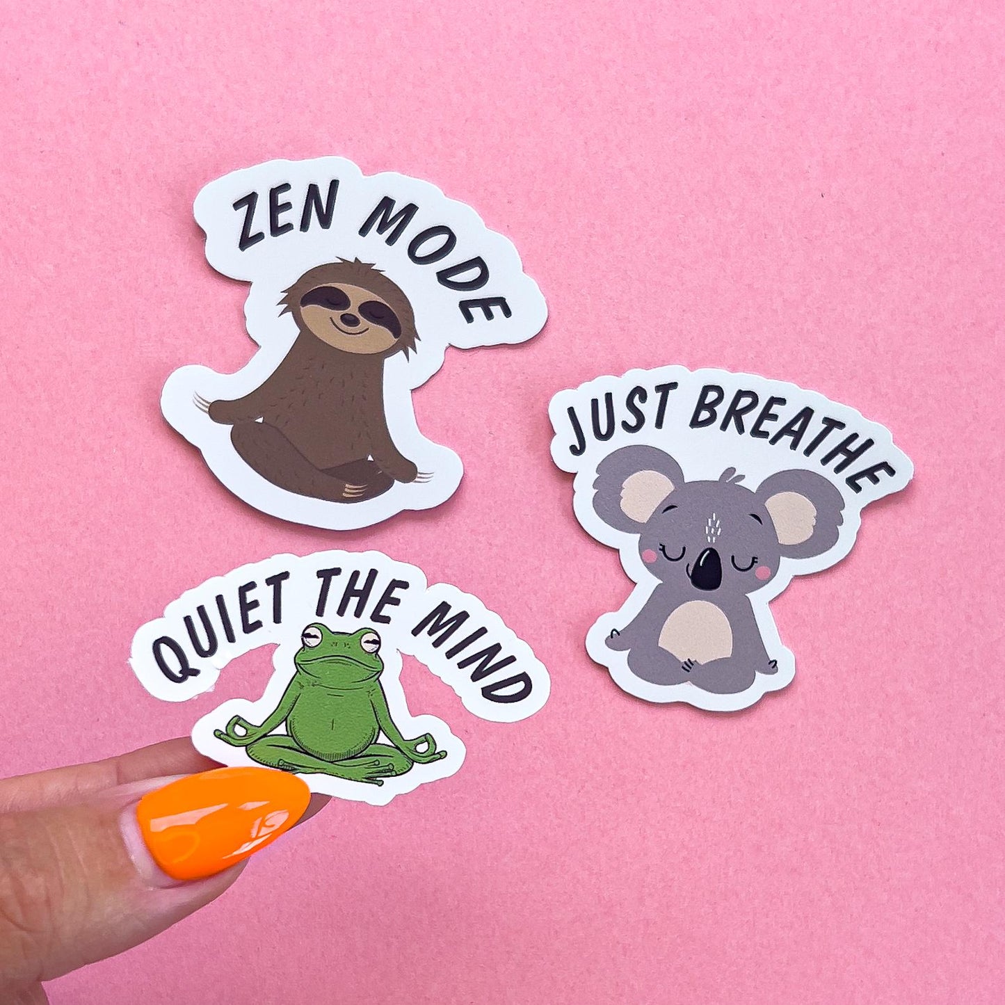 Three vinyl decal sticker options of animals doing yoga with text across the top.
