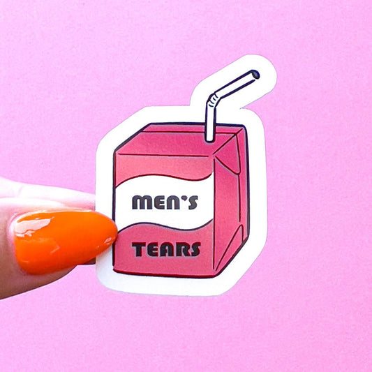 A sticker of a pink juice box with a white label that says 'Men's Tears' and a white straw sticking out of the top.