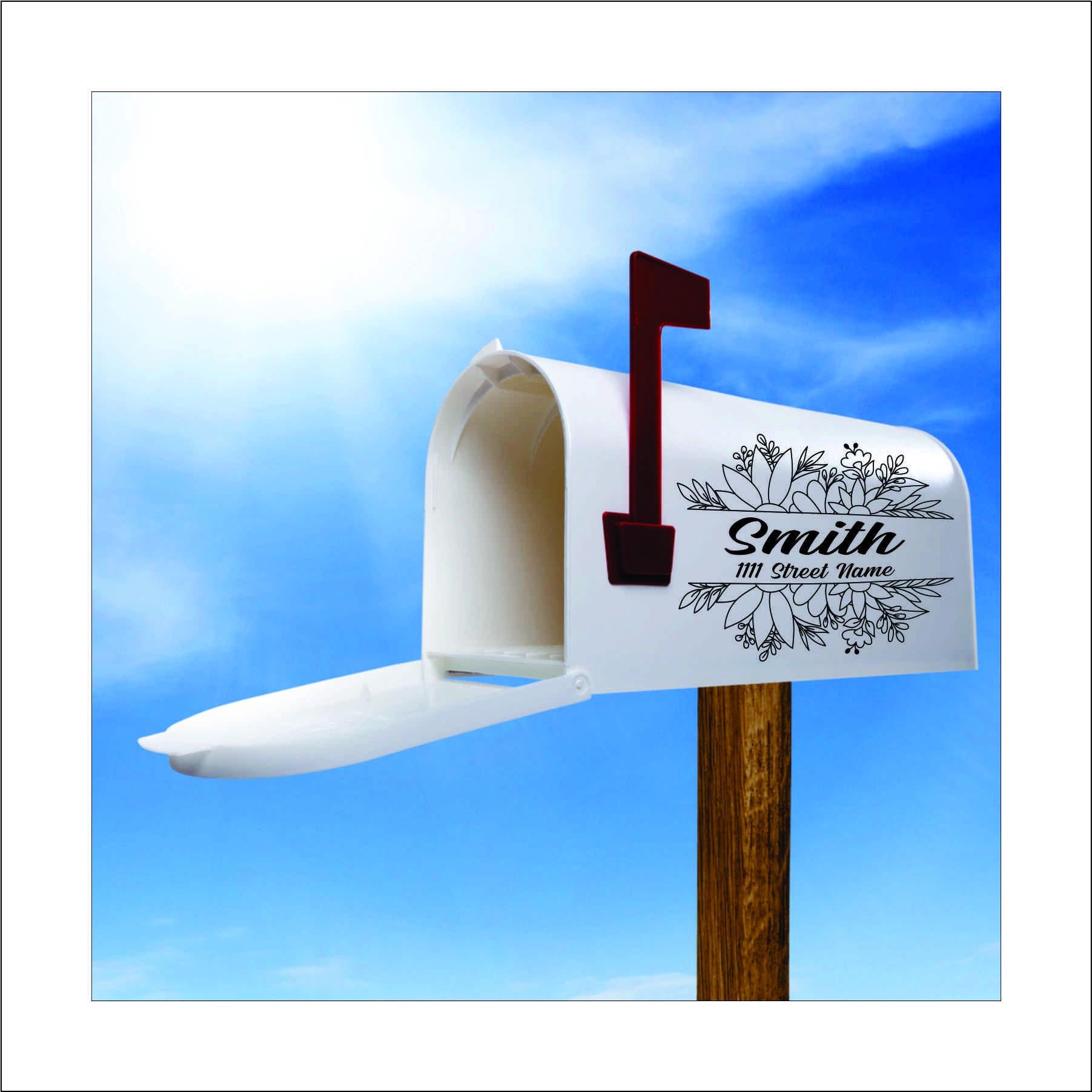 A custom vinyl decal sticker for mailbox with a black floral design and the name 'Smith' and street address printed on it, this would be replaced with your name and address.