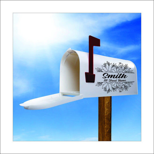 A custom vinyl decal sticker for mailbox with a black floral design and the name 'Smith' and street address printed on it, this would be replaced with your name and address.