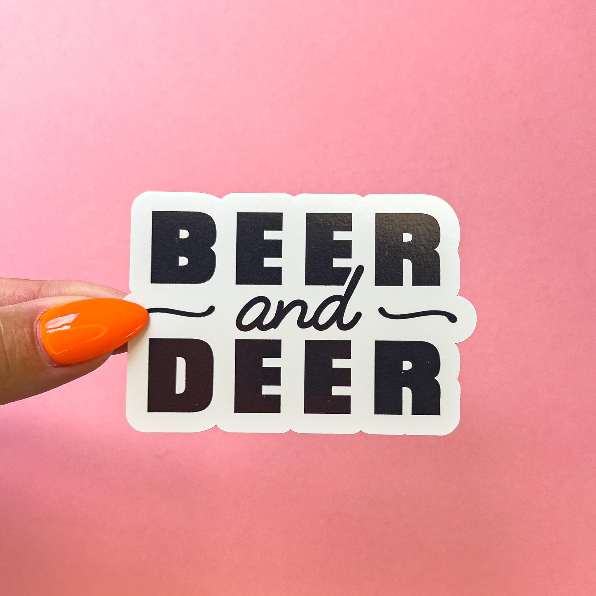 A vinyl decal sticker with black text that reads 'BEER and DEER'.