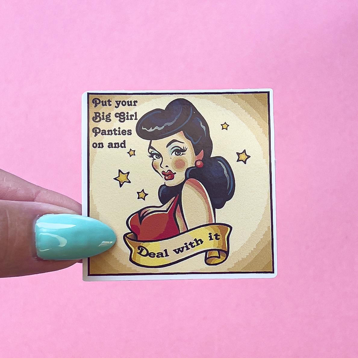 A square vinyl decal sticker of a pinup girl wearing a red dress with black hair. Yellow stars are on either side of the pinup. The background is vintage beige with the text "Put your big girl panties on and deal with it"