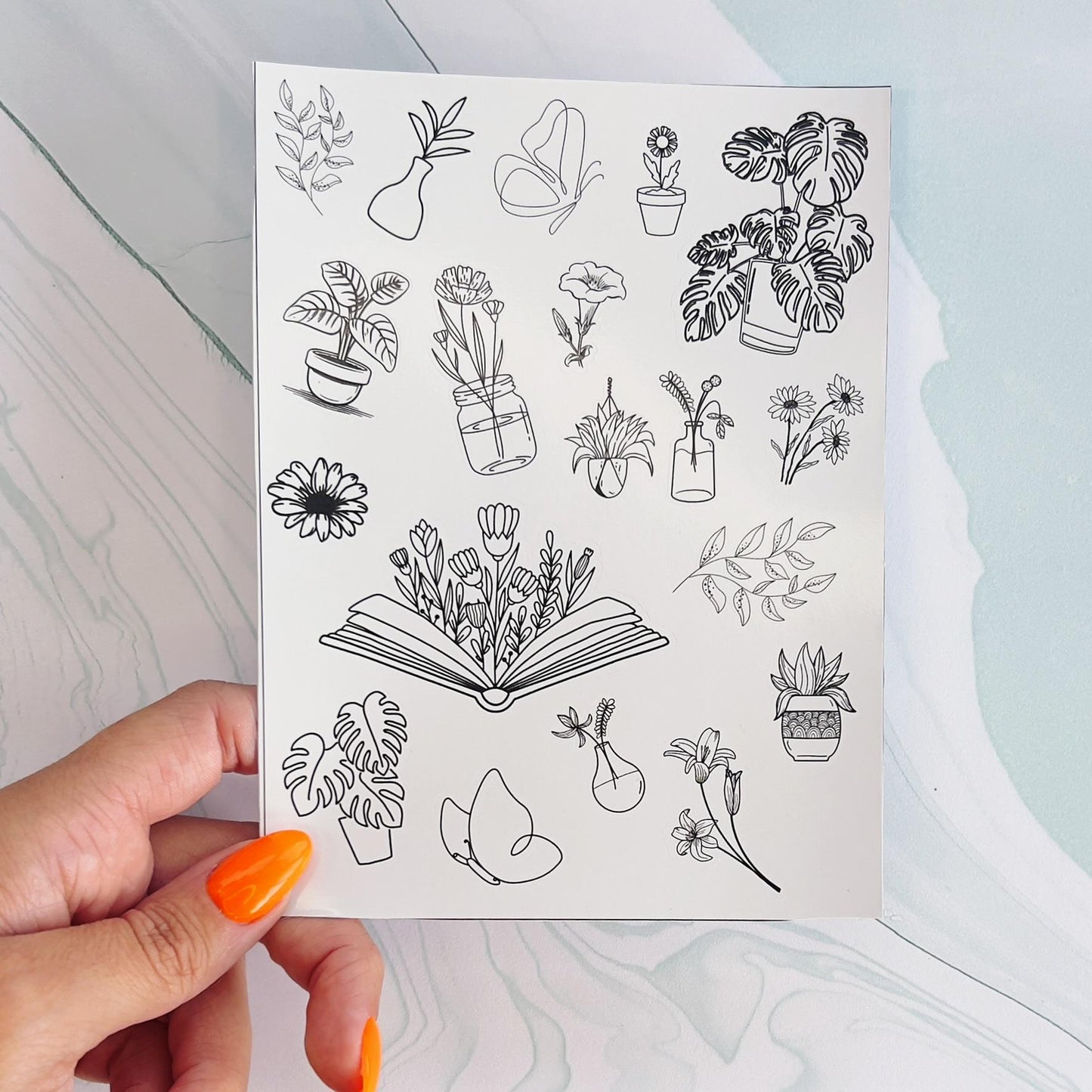 A sheet of various minimalist stickers. All stickers are black line drawings. The stickers include flowers, books, butterflies, and plants in various pots.