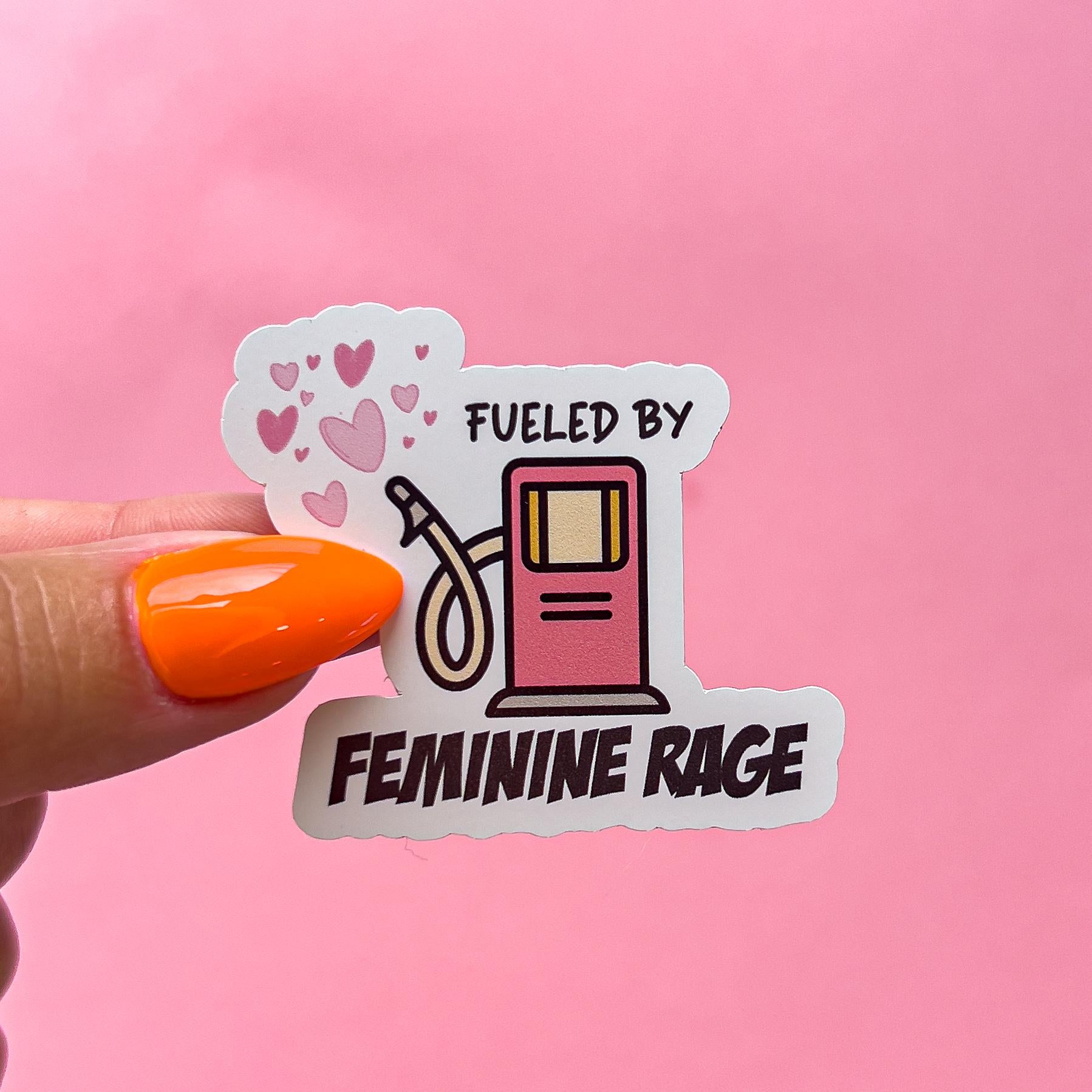 A vinyl decal sticker of a pink, retro gas pump and the text 'Fueled by Feminine Rage' in black.  Pink hearts are in the upper left corner of the sticker.