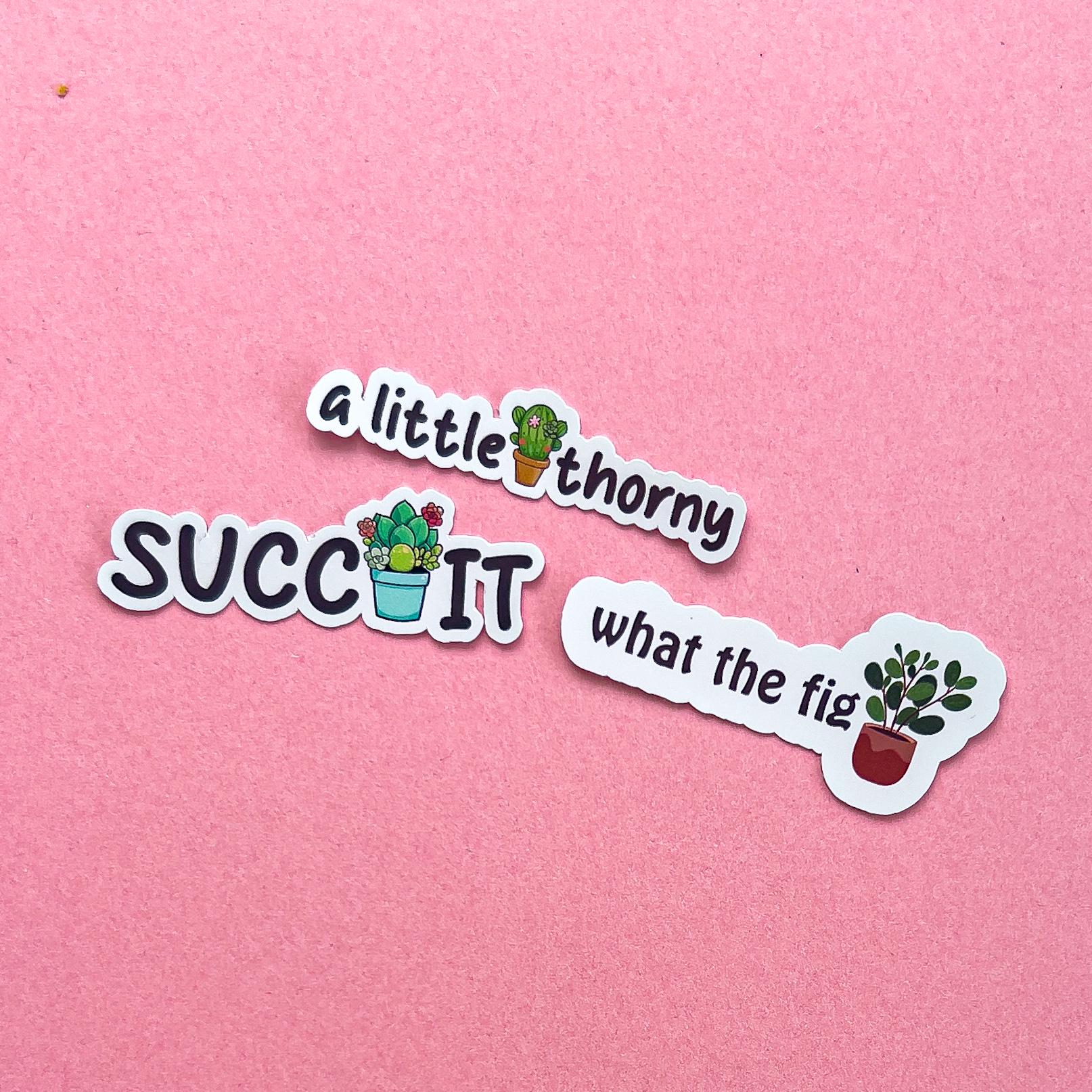 Three vinyl decal stickers of plant puns with plants.