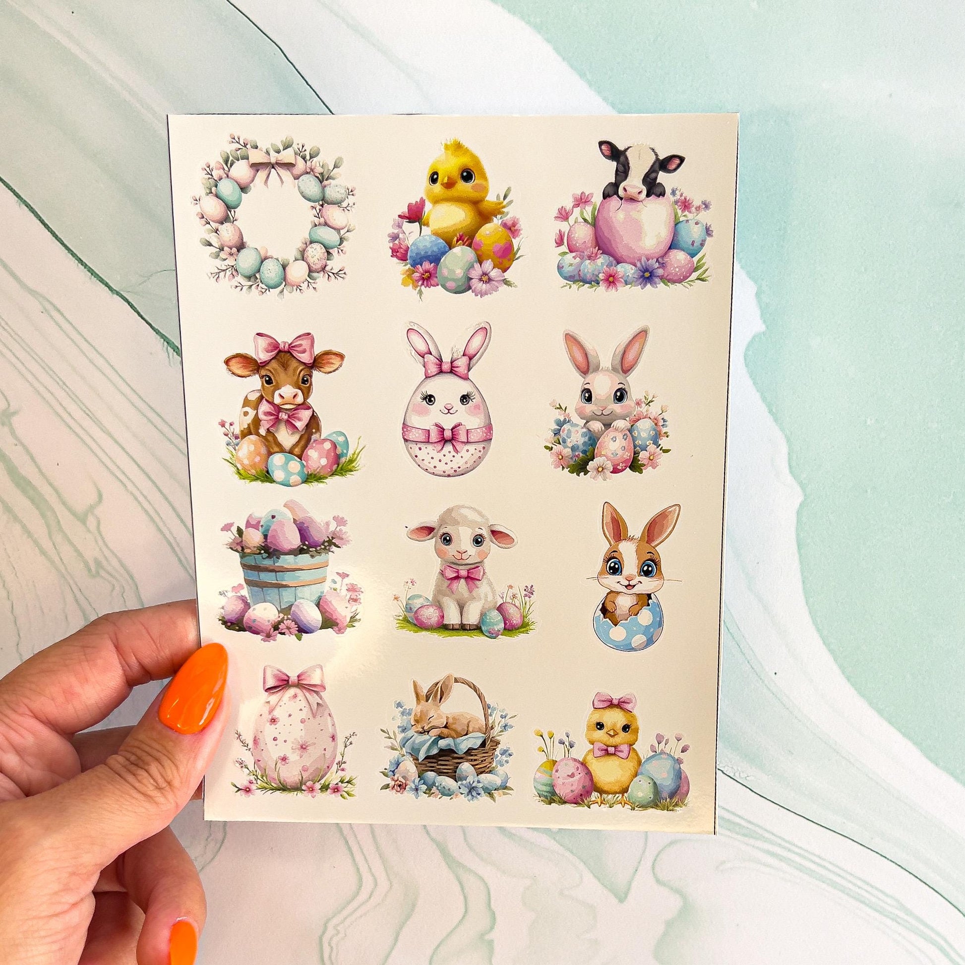 A sheet of various Easter stickers in pastel colors. The stickers include ducks, chicks, bunnies, sheep, cows, Easter eggs, and Easter baskets.