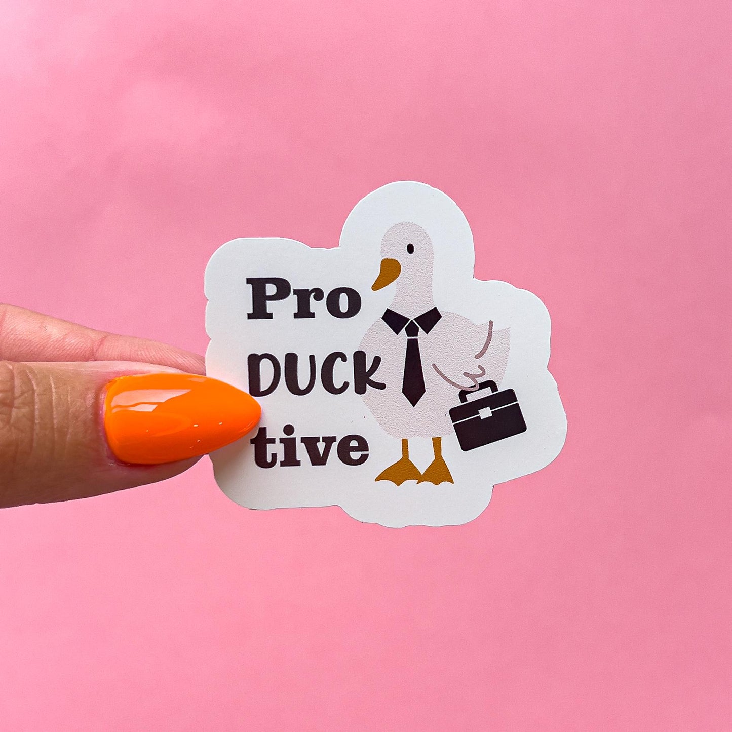 A vinyl decal sticker of a white duck wearing a black tie and holding a black briefcase. The text 'Pro Duck tive' is written beside the duck.