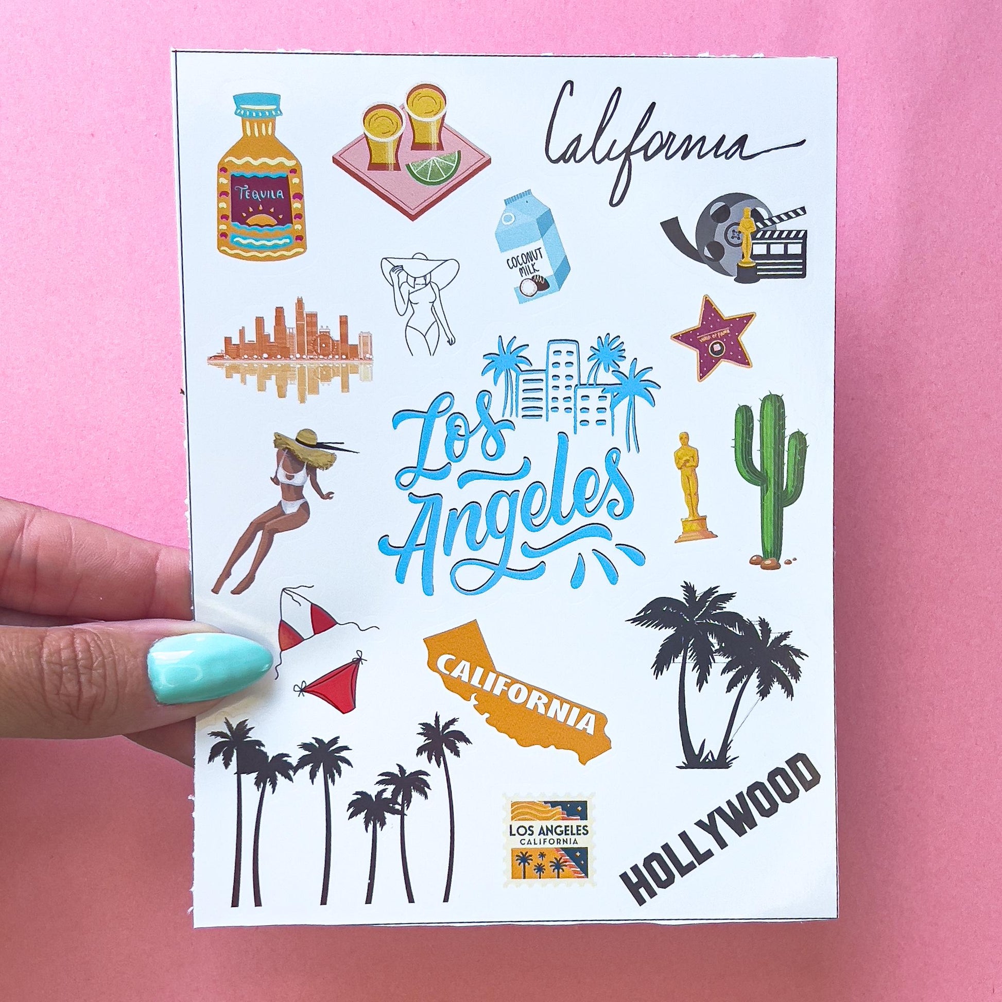A sheet of various stickers depicting Los Angeles, California. The stickers include a palm tree, a cactus, a Hollywood sign, a star, a film reel, a coconut milk carton, a cityscape, a woman in a bikini, a woman in a hat, a glass of tequila, two shots of tequila with a lime wedge, a red bikini, a yellow outline of California, a blue and white sign that says 'Los Angeles' and a red and white sign that says 'Los Angeles, California'.